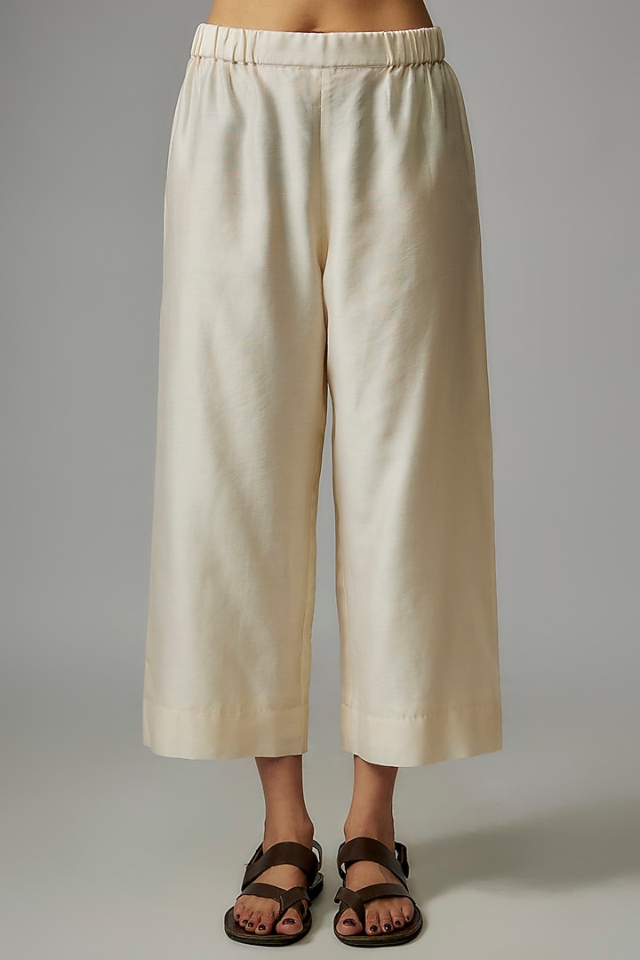 Ivory Mulberry Silk Mirror Embroidered Kurta Set by Divyam Mehta at Pernia's Pop Up Shop
