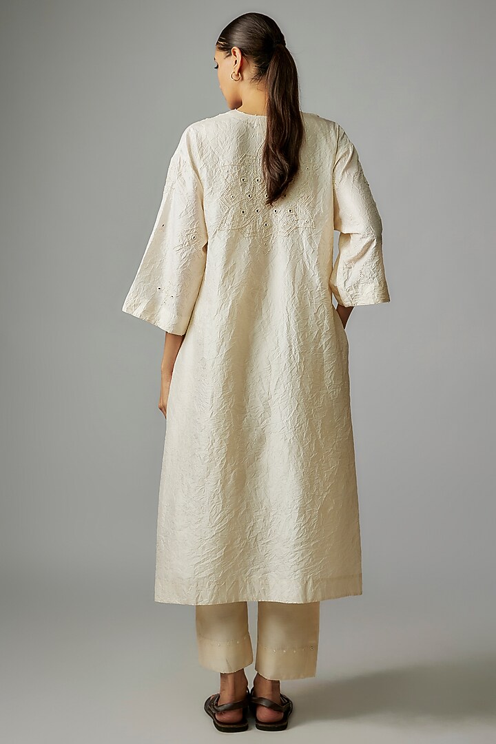 Ivory Mulberry Silk Mirror Embroidered Kurta Set by Divyam Mehta at Pernia's Pop Up Shop