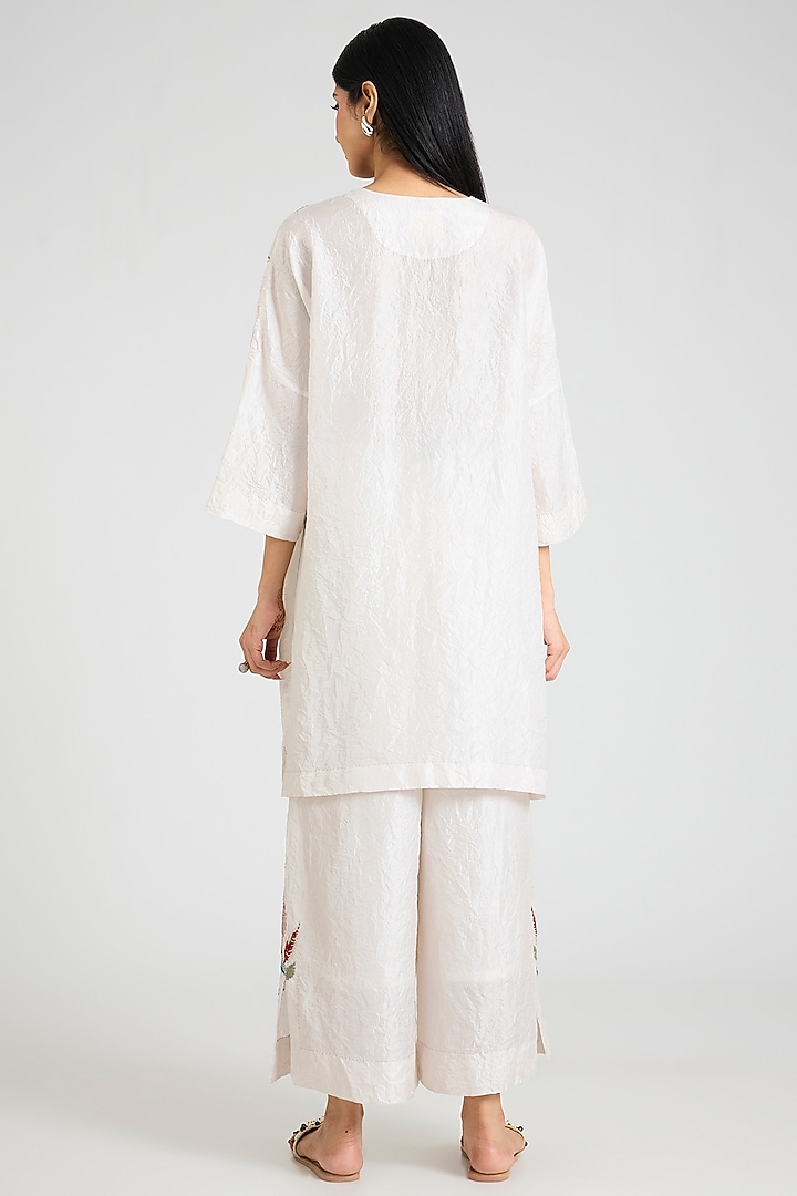 Ivory Mulberry Silk Floral Hand Embroidered Tunic Set by Divyam Mehta at Pernia's Pop Up Shop
