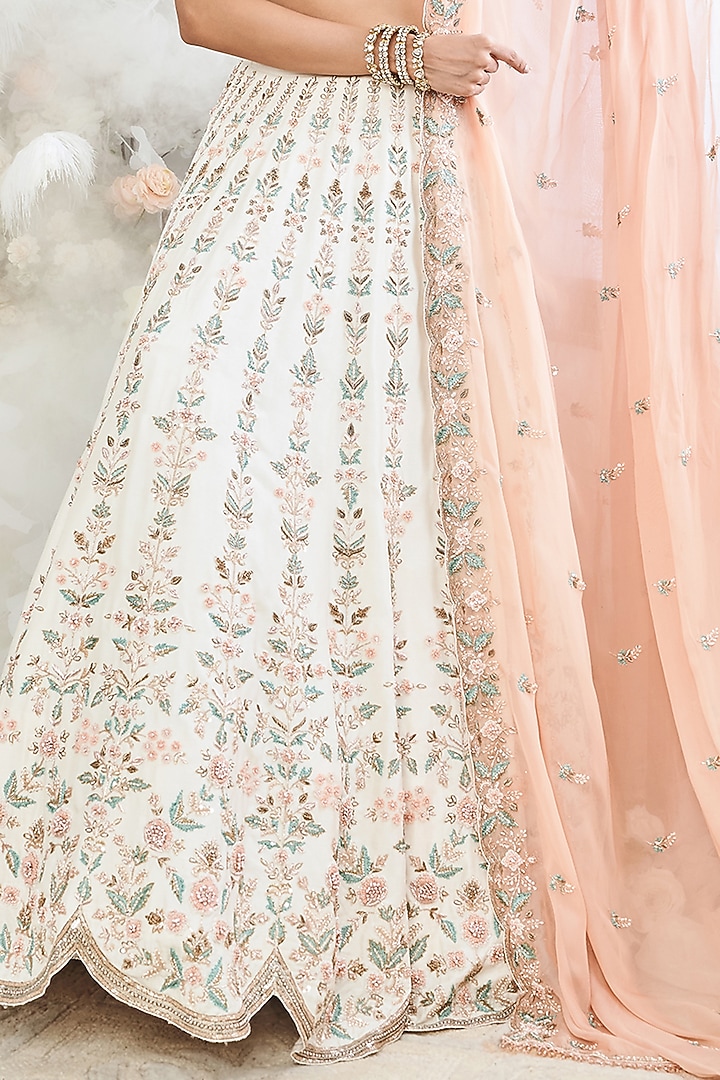 Ivory Silk Resham Embroidered Bridal Lehenga Set by DISHA MUCHHALA at Pernia's Pop Up Shop