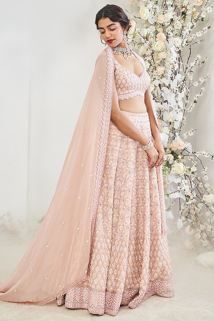 Rusty Pink Silk Sequins Embroidered Wedding Lehenga Set by DISHA MUCHHALA at Pernia's Pop Up Shop