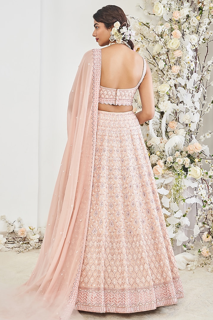 Rusty Pink Silk Sequins Embroidered Wedding Lehenga Set by DISHA MUCHHALA at Pernia's Pop Up Shop