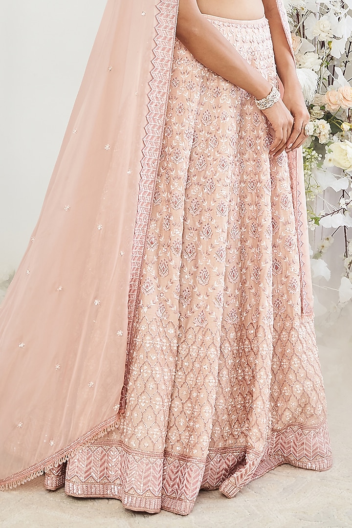 Rusty Pink Silk Sequins Embroidered Wedding Lehenga Set by DISHA MUCHHALA at Pernia's Pop Up Shop