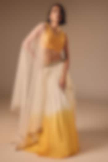 Yellow & Ivory Shaded Chiffon Lehenga Set by DISHA MUCHHALA at Pernia's Pop Up Shop