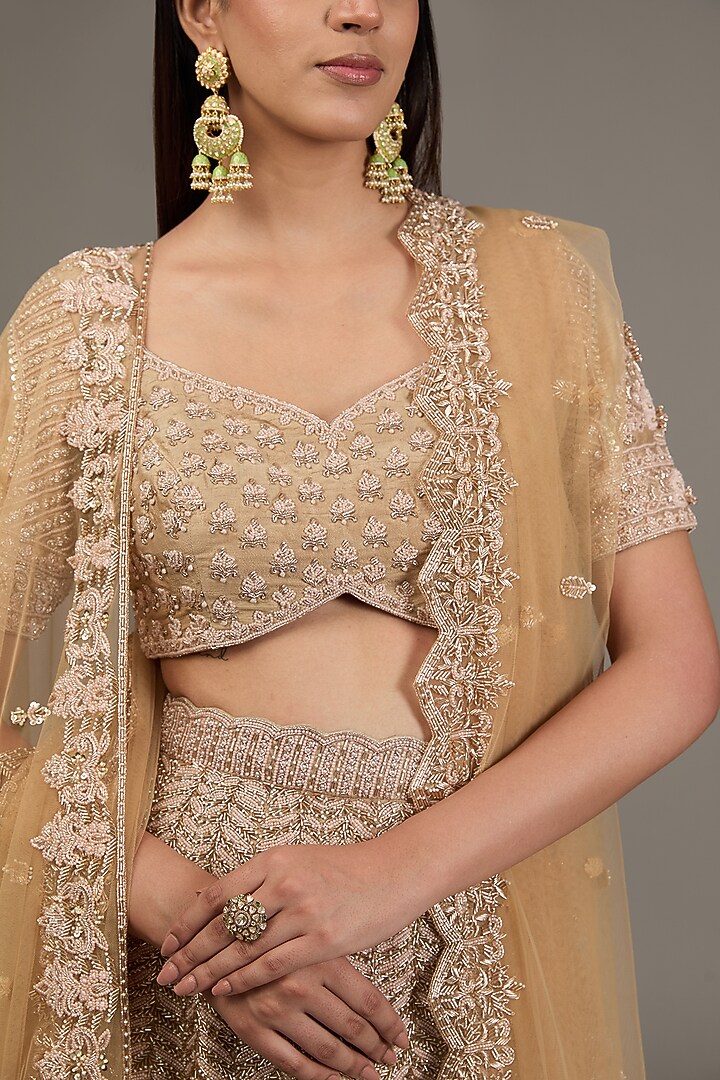 Gold Raw Silk Hand Embellished Bridal Lehenga Set by Disha Patil at Pernia's Pop Up Shop
