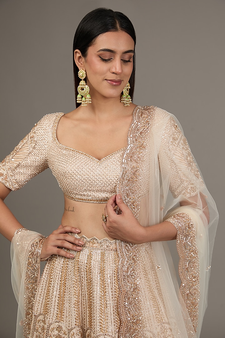 Beige Raw Silk Hand Embellished Bridal Lehenga Set by Disha Patil at Pernia's Pop Up Shop