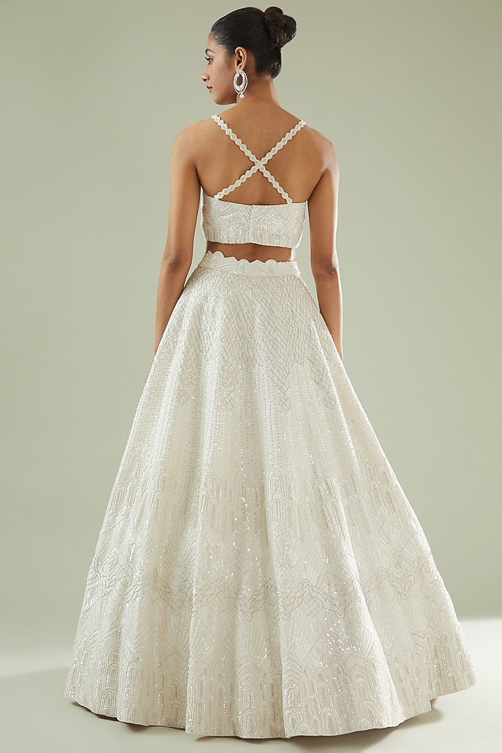 Ivory Raw Silk Embellished Bridal Lehenga Set by Disha Patil at Pernia's Pop Up Shop