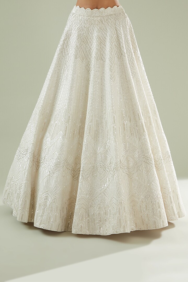 Ivory Raw Silk Embellished Bridal Lehenga Set by Disha Patil at Pernia's Pop Up Shop