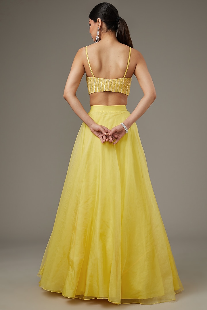 Yellow Net Hand Embroidered Jacket Set by Disha Patil at Pernia's Pop Up Shop