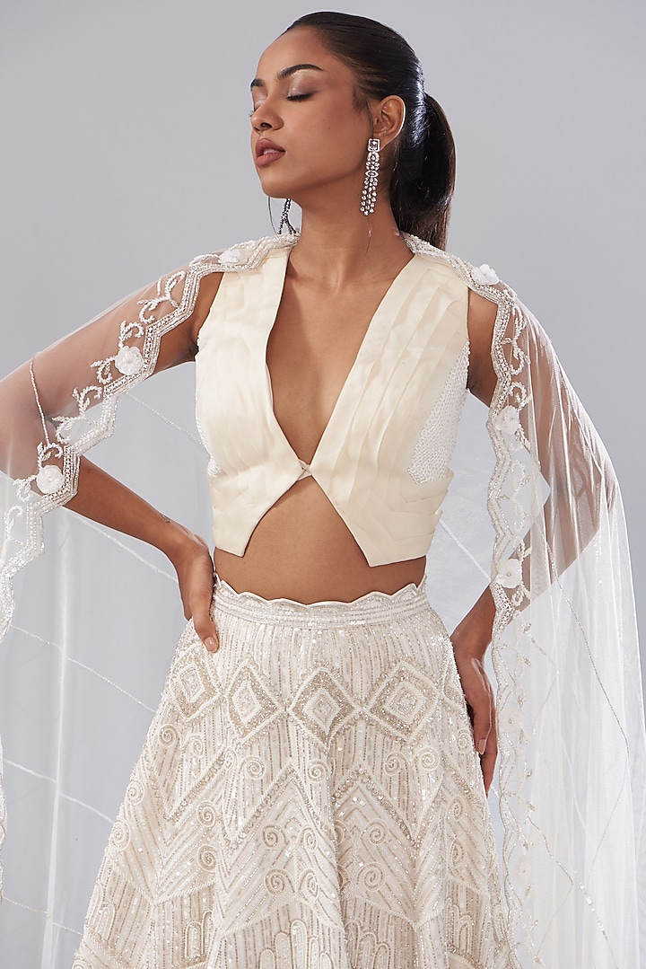 Ivory Raw Silk Hand Embellished Bridal Lehenga Set by Disha Patil at Pernia's Pop Up Shop
