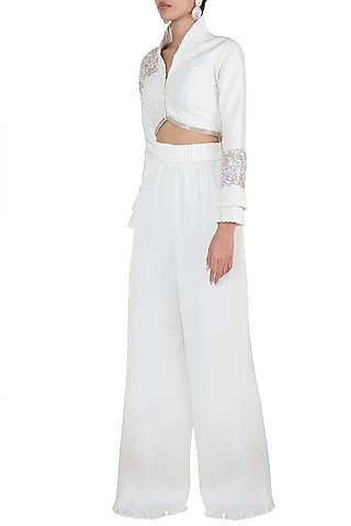 Ivory embroidered jacket with palazzo pants by Disha Kahai