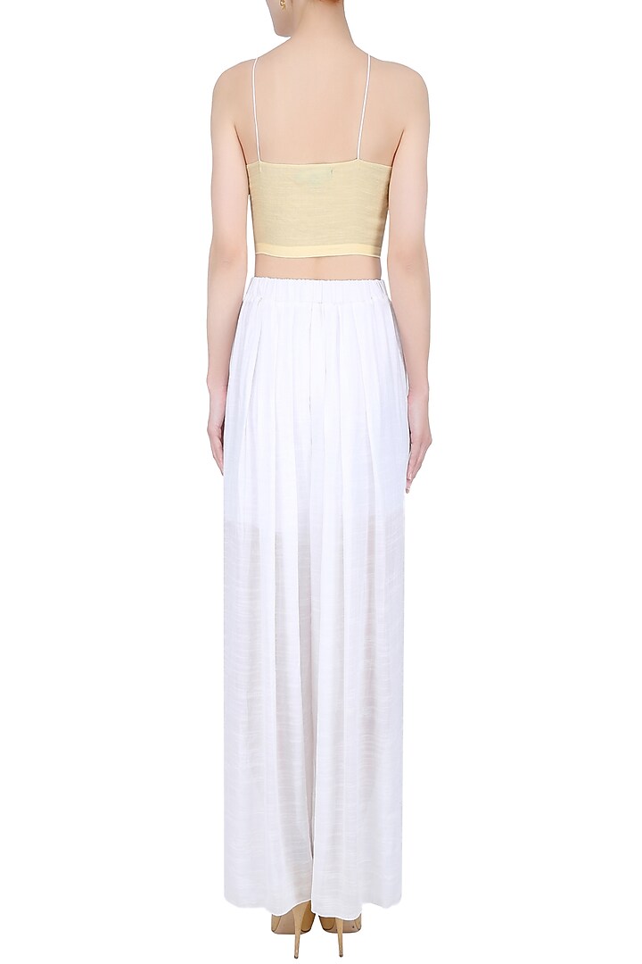 Ivory box pleated trouser pants available only at Pernia's Pop Up Shop.