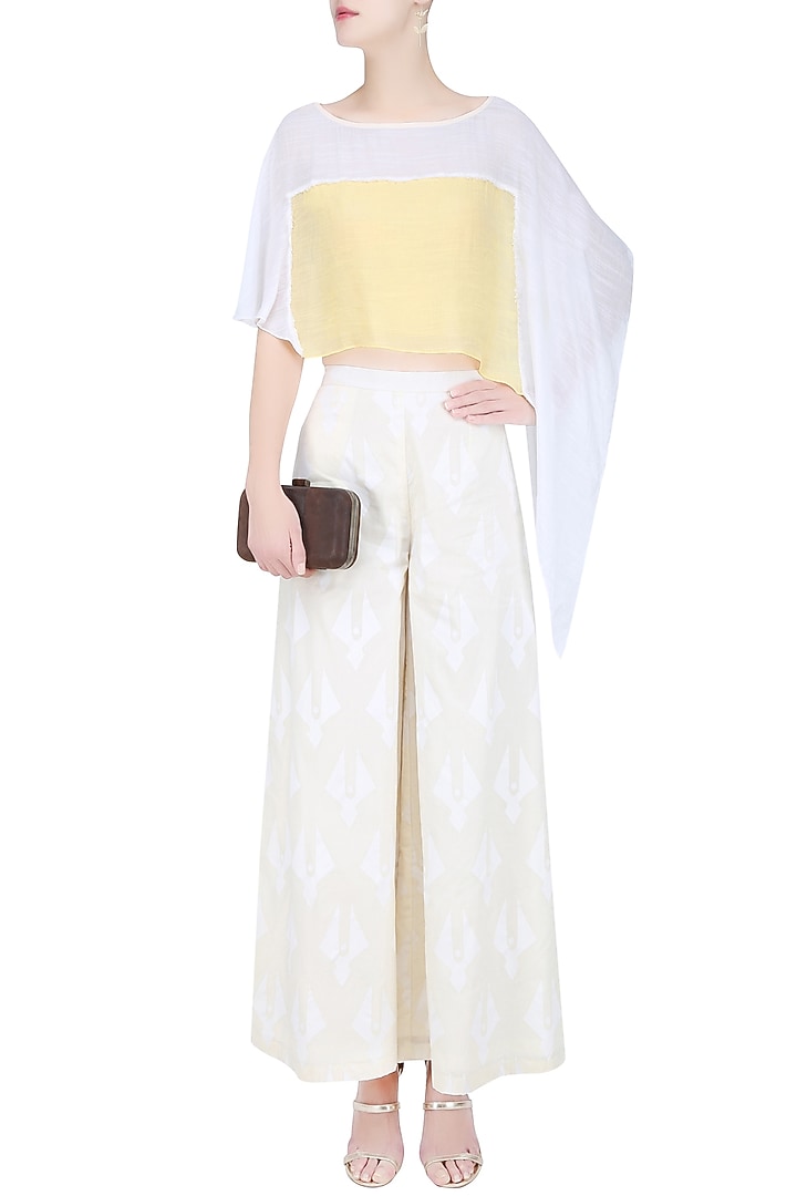 Mango yellow and ivory asymmetric hem crop top available only at Pernia's Pop Up Shop.