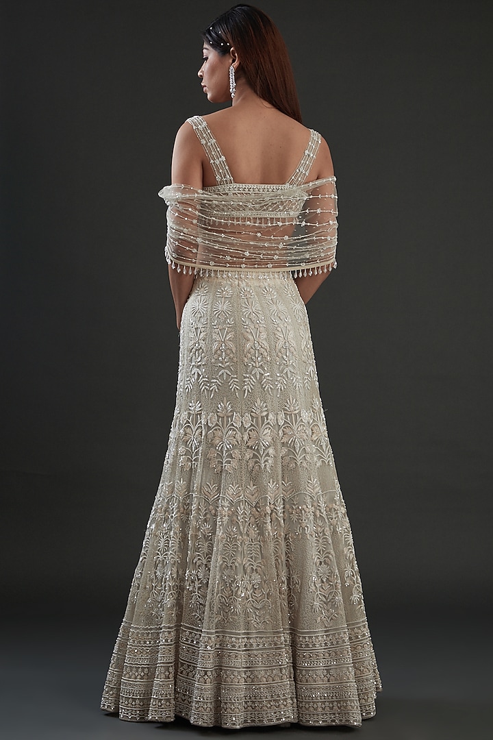 Ivory Net Hand Embroidered Bridal Lehenga Set by Diksha Tandon at Pernia's Pop Up Shop