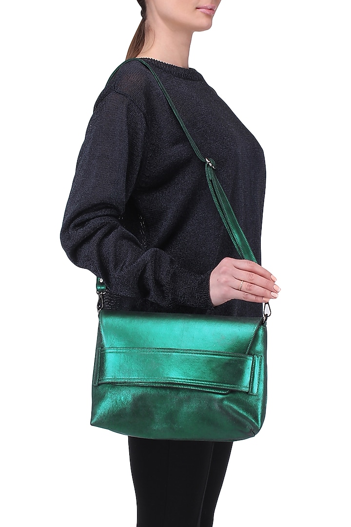 Teal metallic sling bag available only at Pernia's Pop Up Shop.
