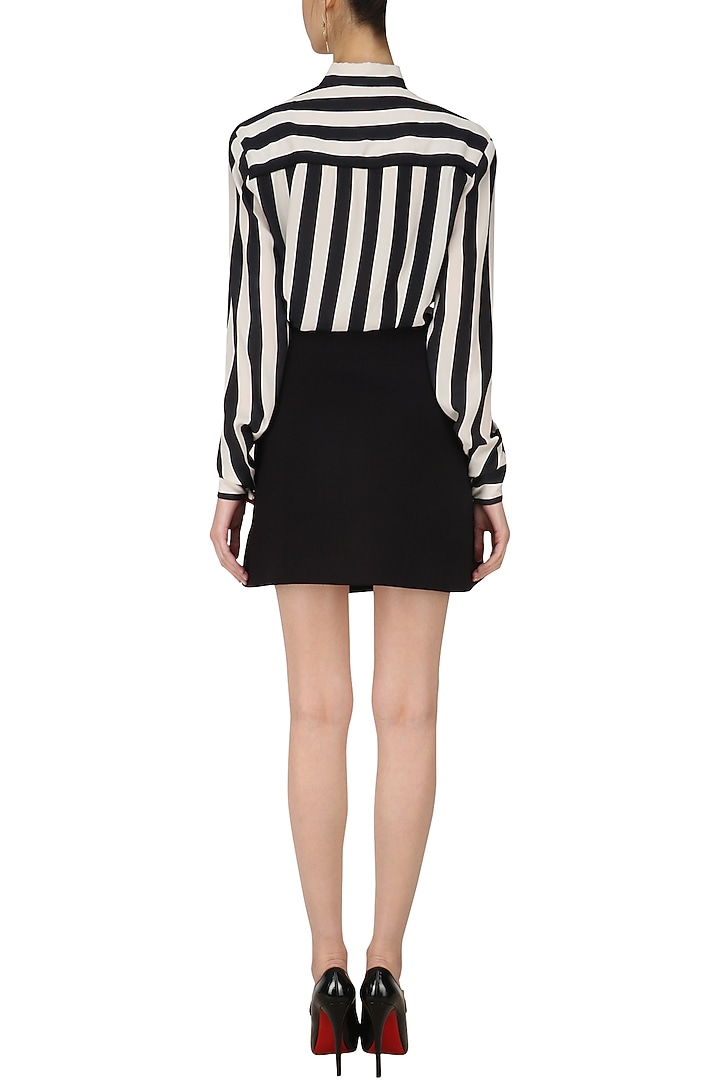 Black asymmetric wrap skirt available only at Pernia's Pop Up Shop.