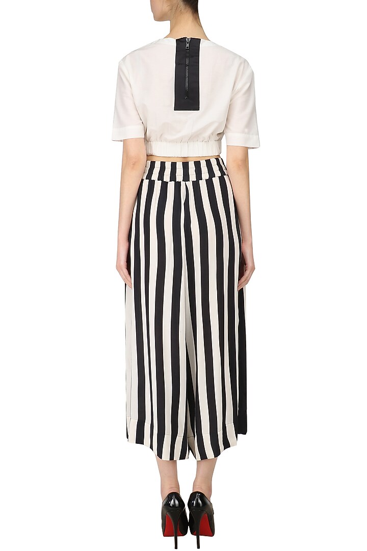 Stripe black boxing flare pants available only at Pernia's Pop Up Shop.