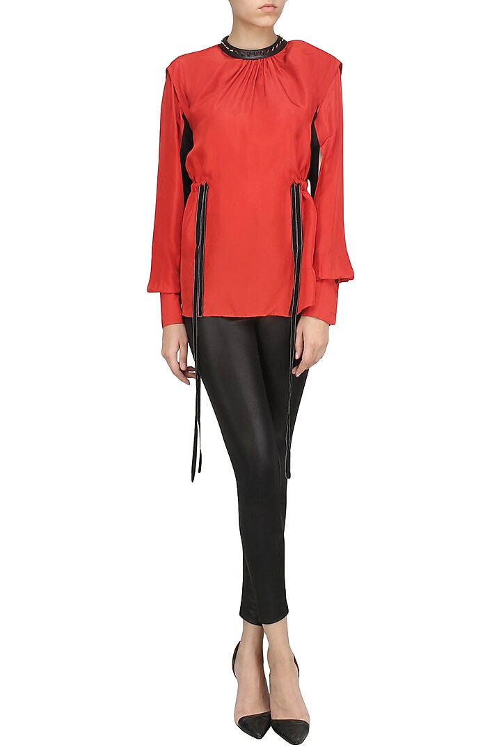 Orange adjustable waist shirt available only at Pernia's Pop Up Shop.