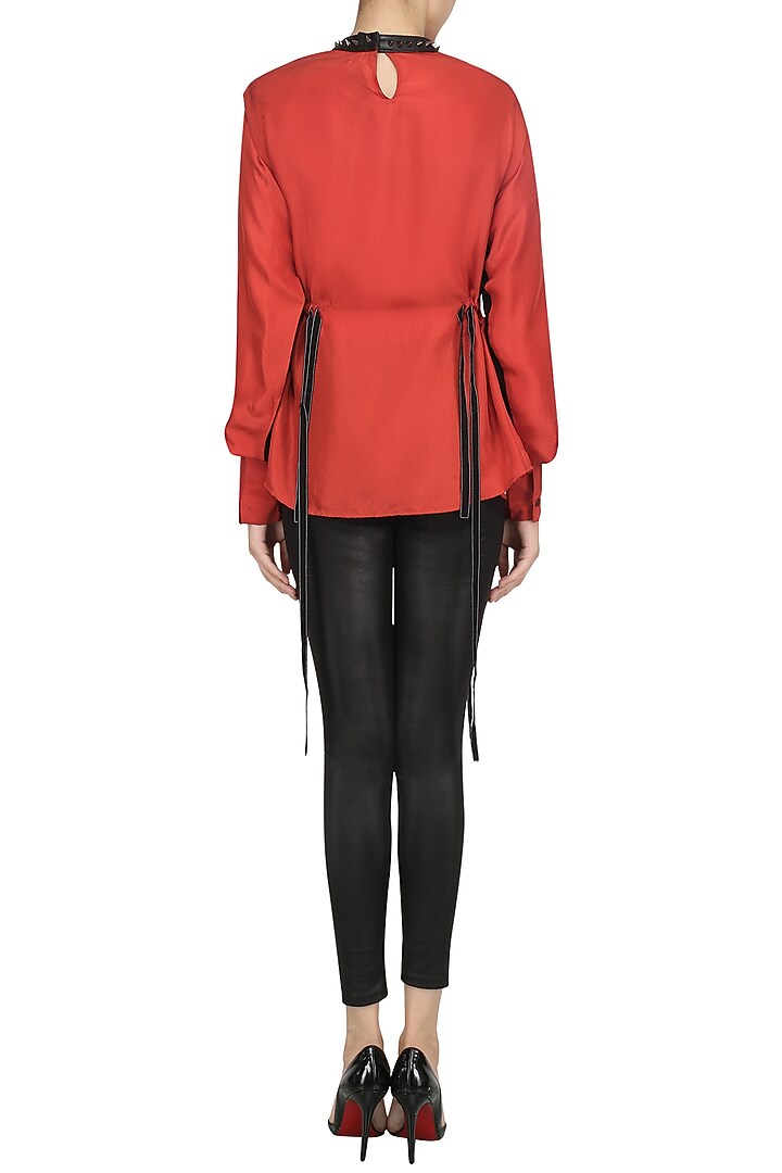 Orange adjustable waist shirt available only at Pernia's Pop Up Shop.