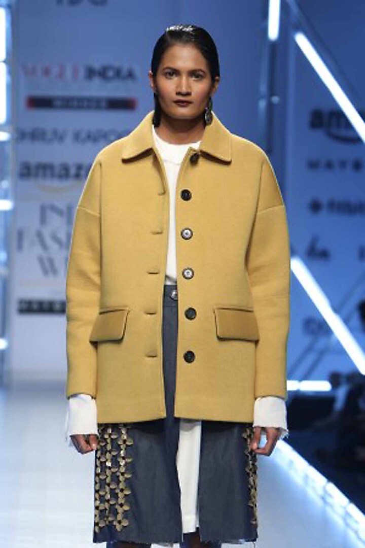 Mustard day coat available only at Pernia's Pop Up Shop.