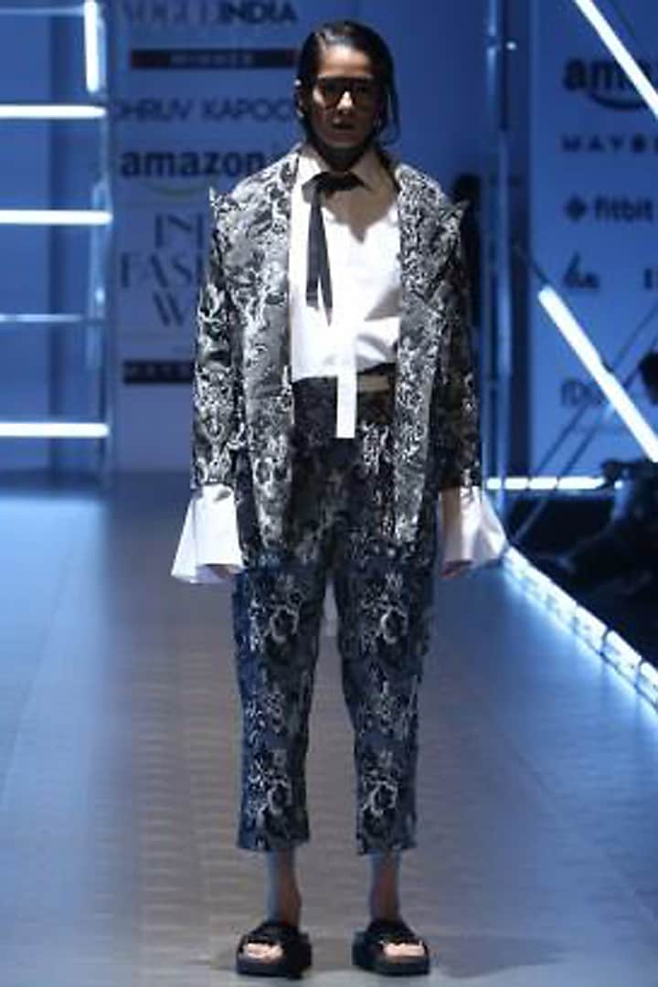 Black and white jacquard trousers by Dhruv Kapoor
