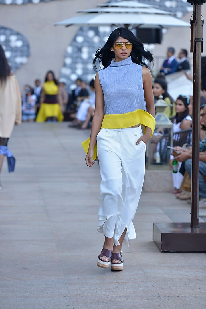Blue high rise panelled high low gabriel blouse available only at Pernia's Pop Up Shop.