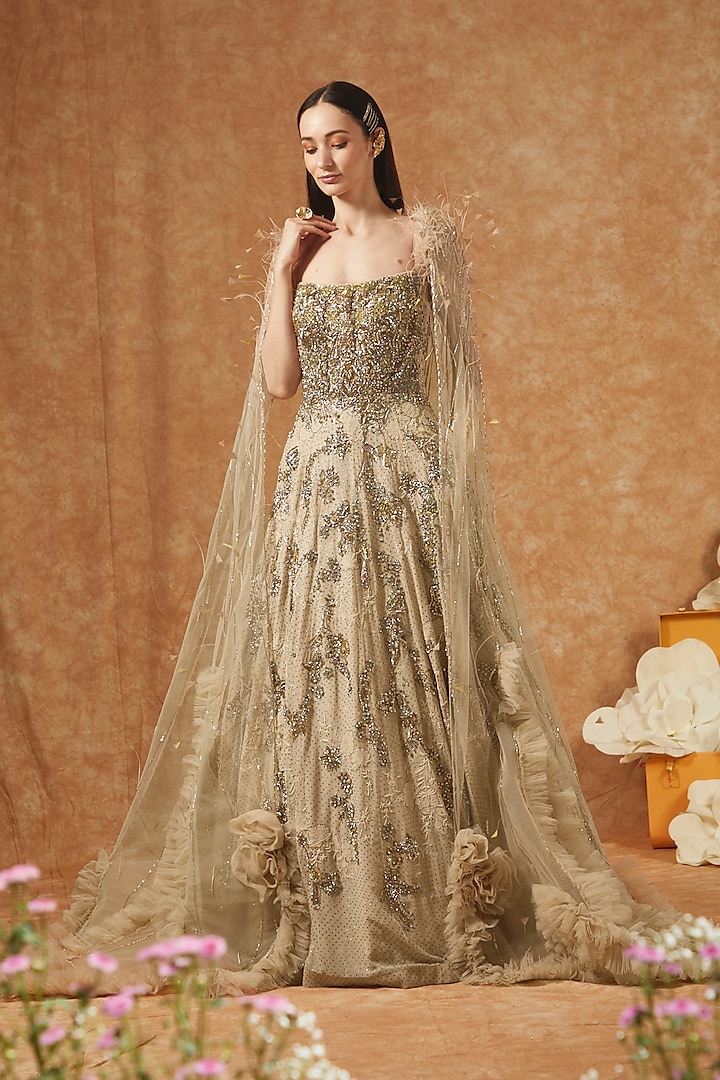 Beige Shimmer Tulle Gown With Cape by Dolly J