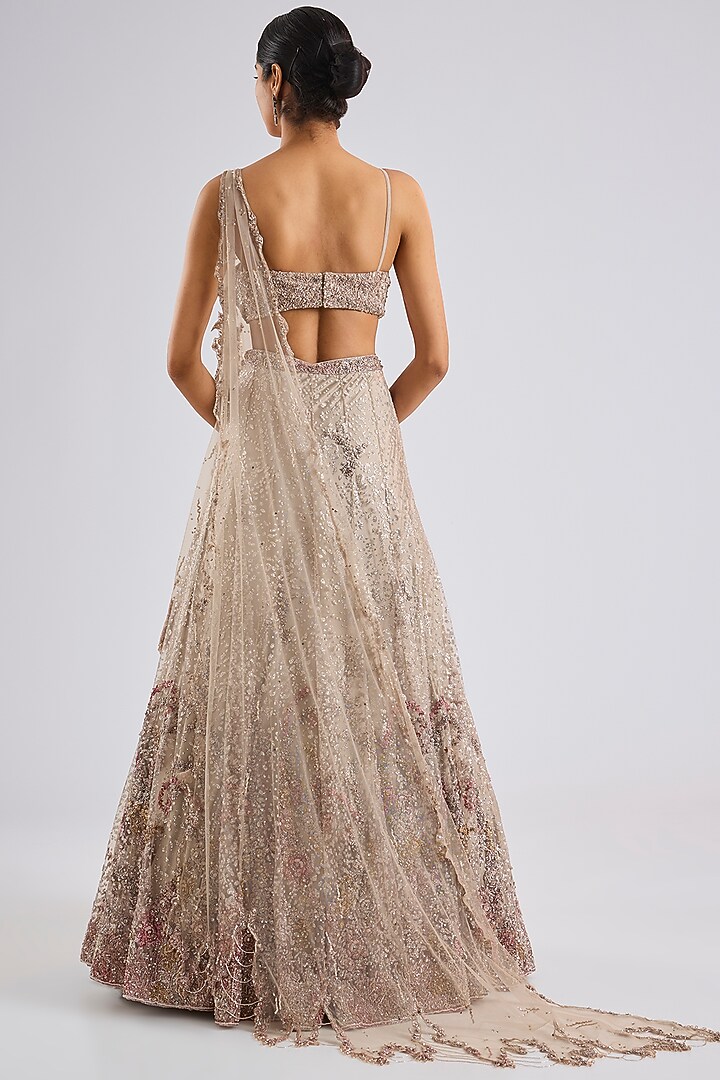 Ivory Shimmer Tulle Sequins Embellished Bridal Lehenga Set by Dolly J at Pernia's Pop Up Shop