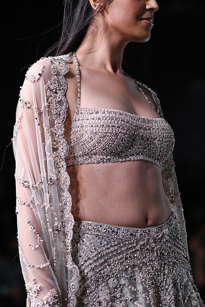 Silver Shimmer Tulle Embroidered Bridal Lehenga Set by Dolly J at Pernia's Pop Up Shop