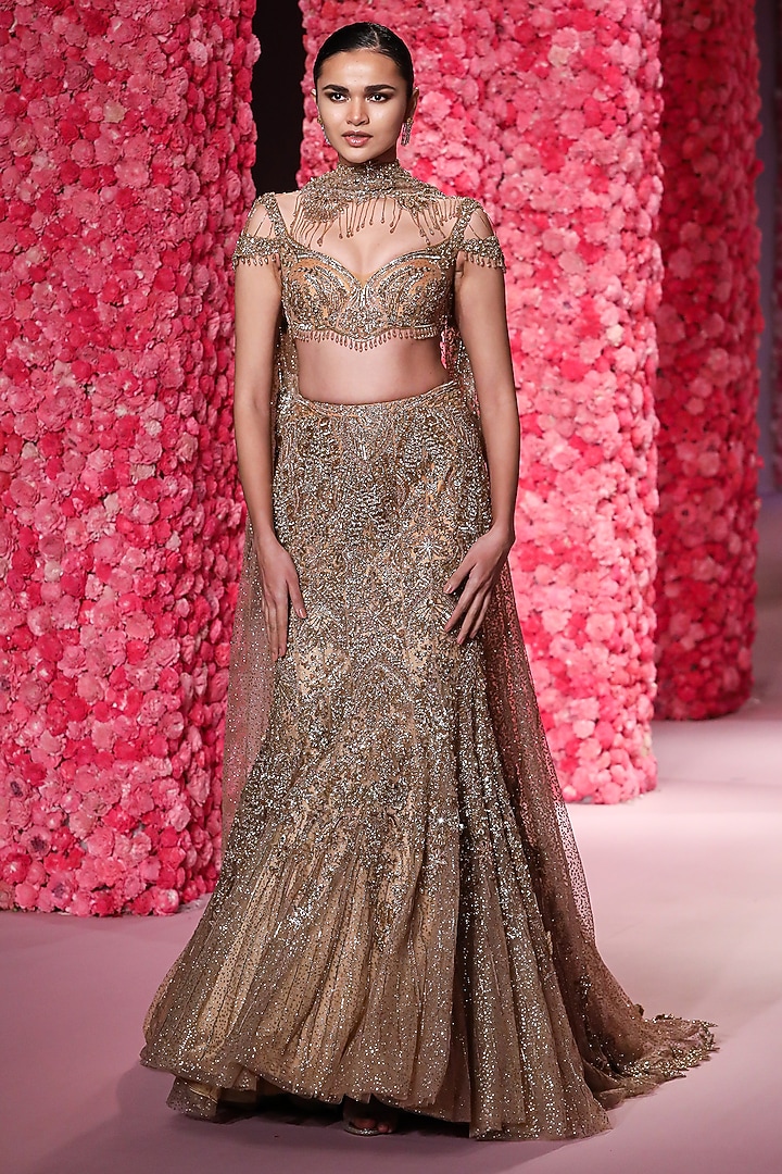 Yellow Gold Shimmer Tulle Hand Beaded Bridal Lehenga Set by Dolly J at Pernia's Pop Up Shop