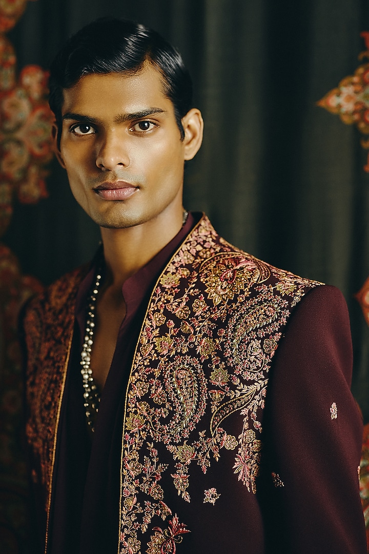 Maroon Japanese Crepe Kashmiri Embroidered Groom Indowestern Set by Dolly J MAN at Pernia's Pop Up Shop