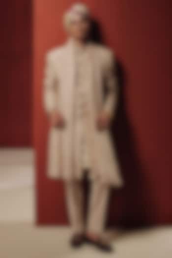 Rose Gold Raw Silk Embroidered Groom Sherwani Set by Dolly J MAN at Pernia's Pop Up Shop