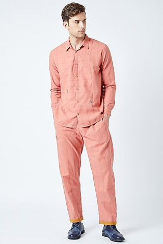 Peach Printed & Embroidered Pants by Doodlage Men