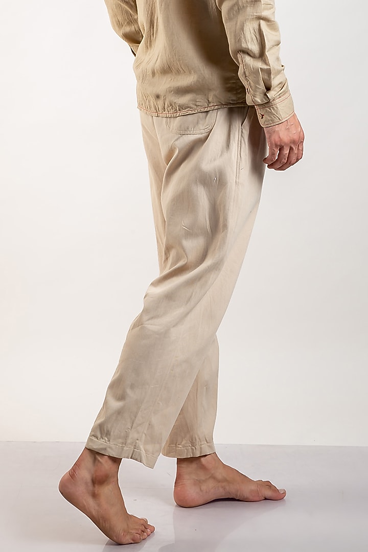 Beige Upcycled Cotton Pleated Pants by Doodlage Men at Pernia's Pop Up Shop