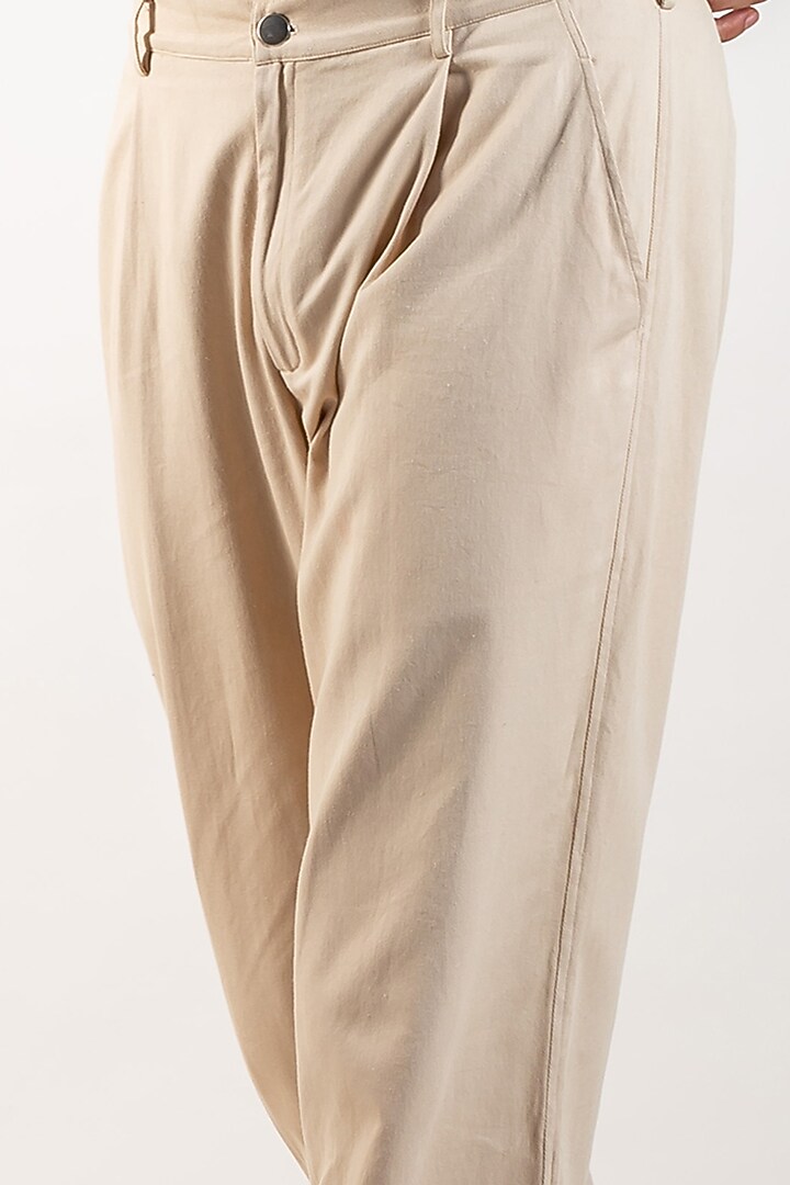 Beige Upcycled Cotton Pleated Pants by Doodlage Men at Pernia's Pop Up Shop