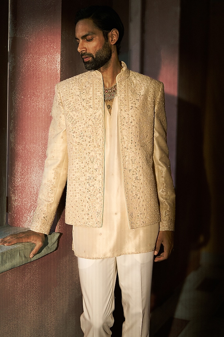 Ivory Raw Silk Dori Embroidered Short Groom Indowestern Jacket Set by Dolly J MAN at Pernia's Pop Up Shop