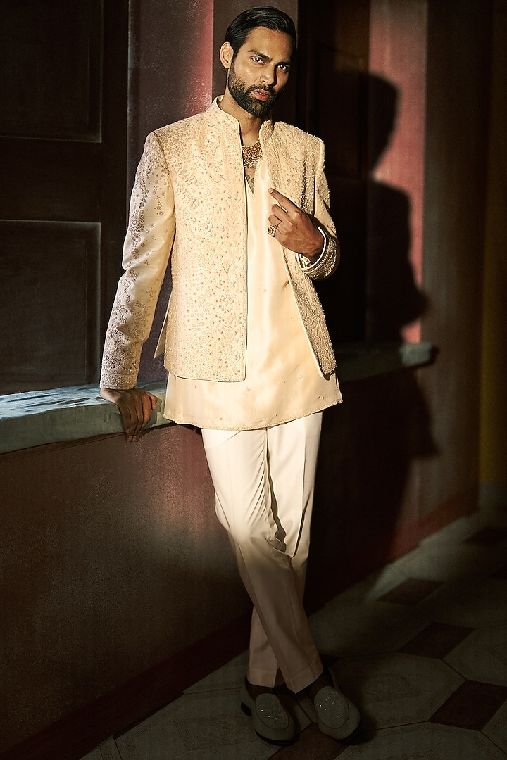 Ivory Raw Silk Dori Embroidered Short Groom Indowestern Jacket Set by Dolly J MAN at Pernia's Pop Up Shop