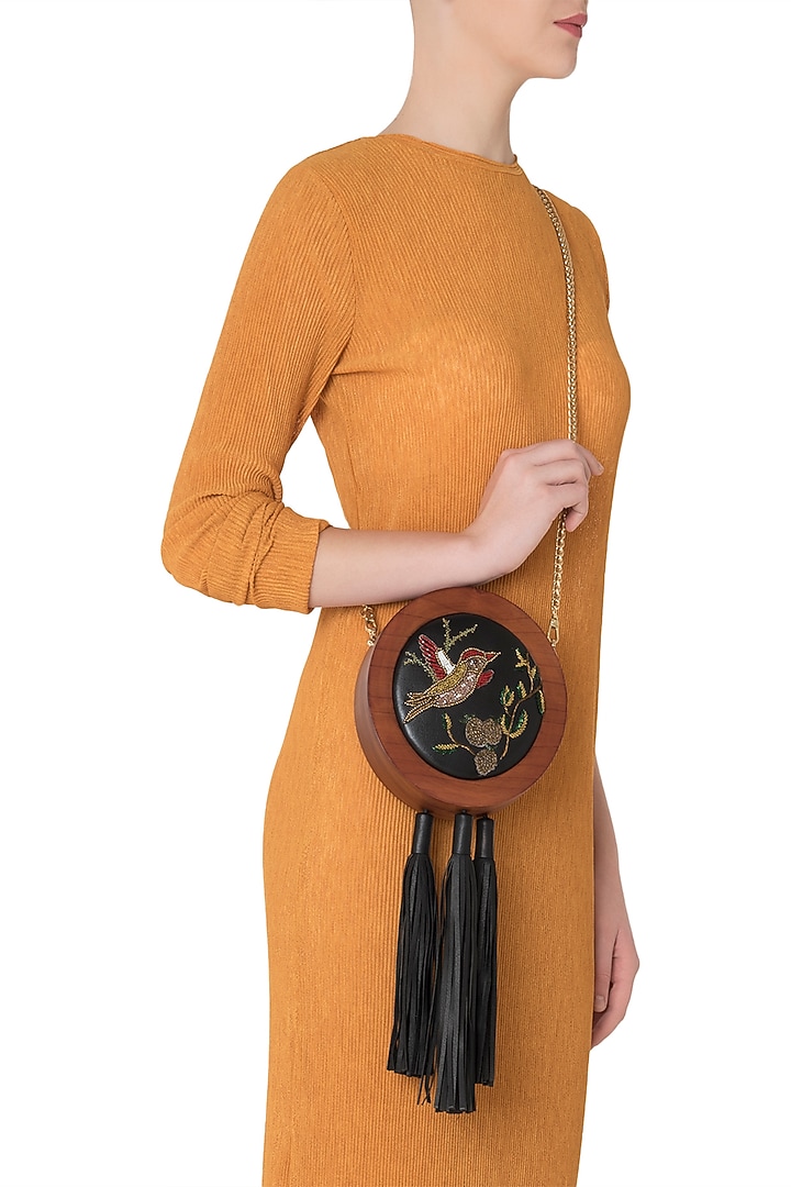 Black embroidered multi tassel clutch available only at Pernia's Pop Up Shop.