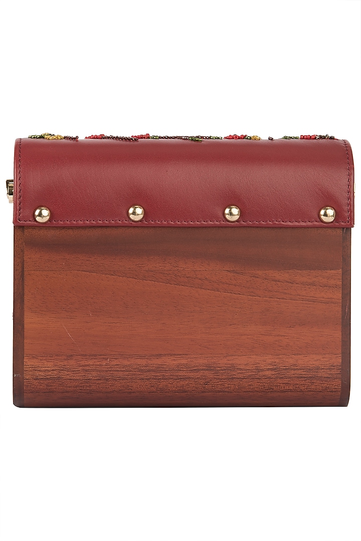 Red embroidered flapover clutch available only at Pernia's Pop Up Shop.