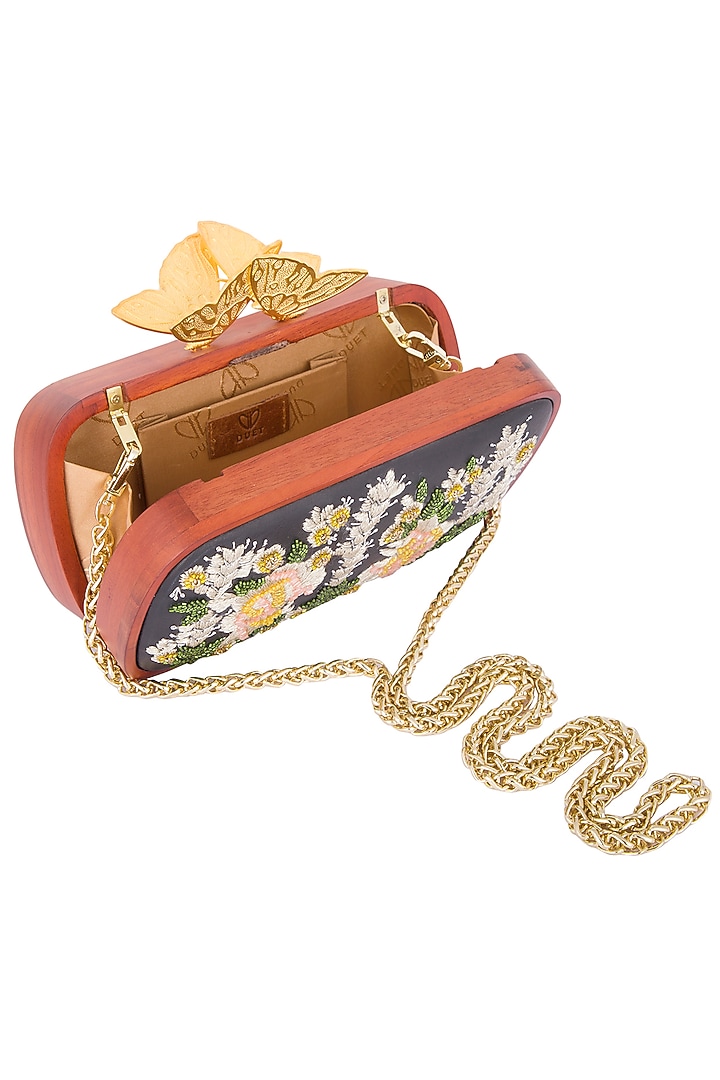 Black floral embroidered clutch bag by Duet Luxury at Pernia's Pop Up Shop