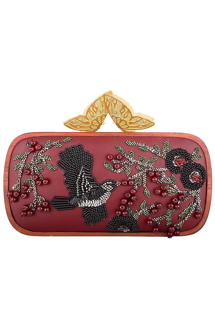 Red embroidered clutch bag by Duet Luxury