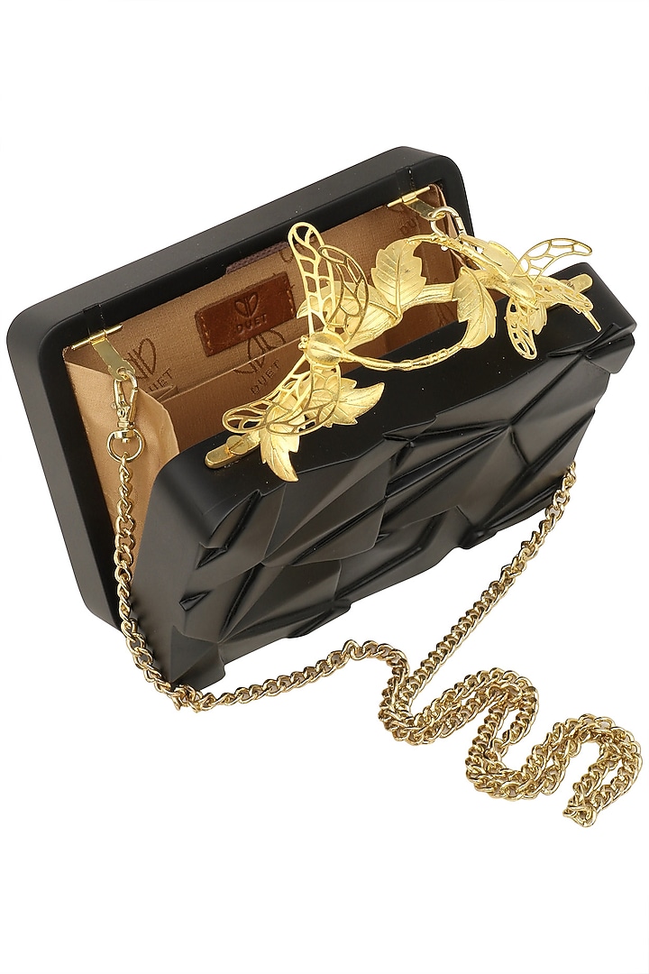 Duet Luxury presents Black Asymmetric Grasshopper Clutch available only at Pernia's Pop Up Shop.