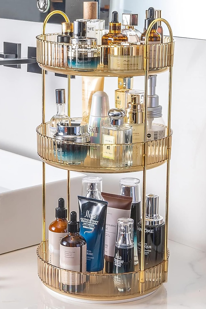 Amber Plastic & Metal Three-Tier Rotating Makeup Organizer by Mason Home at Pernia's Pop Up Shop
