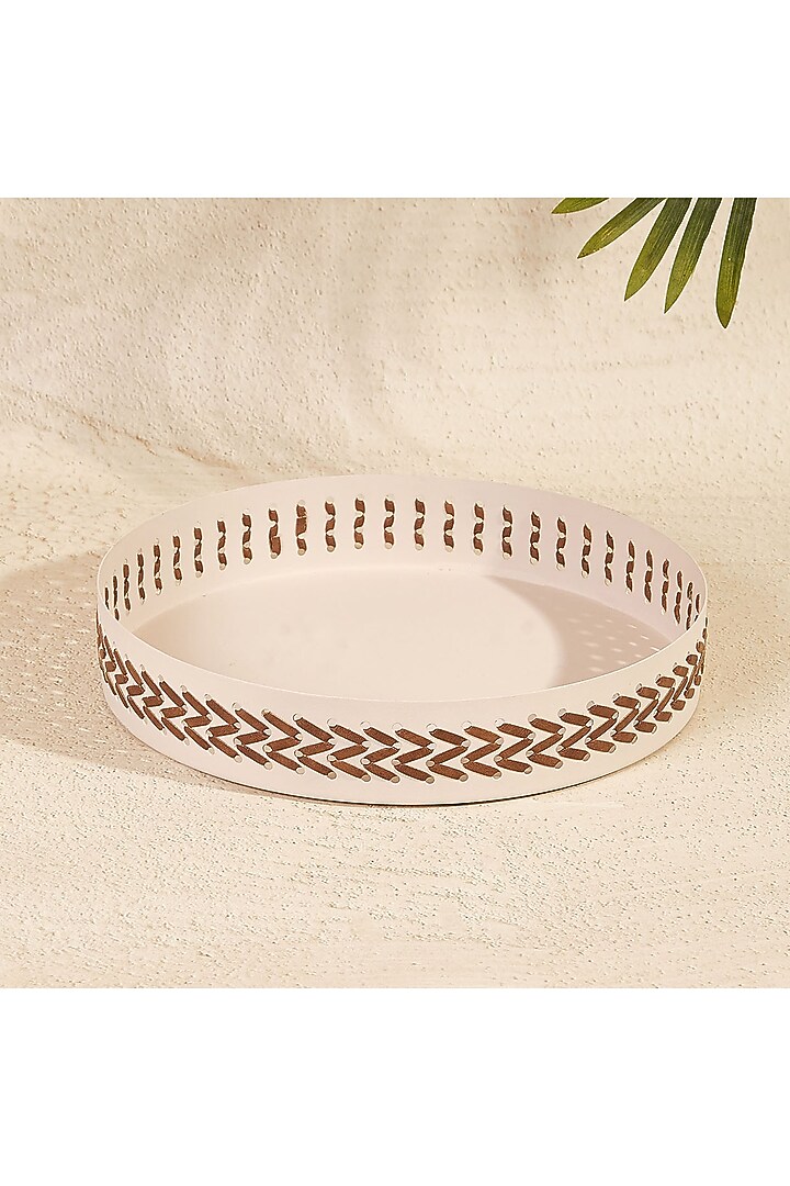 Ivory Metal & Faux Leather Round Serving Tray by Mason Home at Pernia's Pop Up Shop