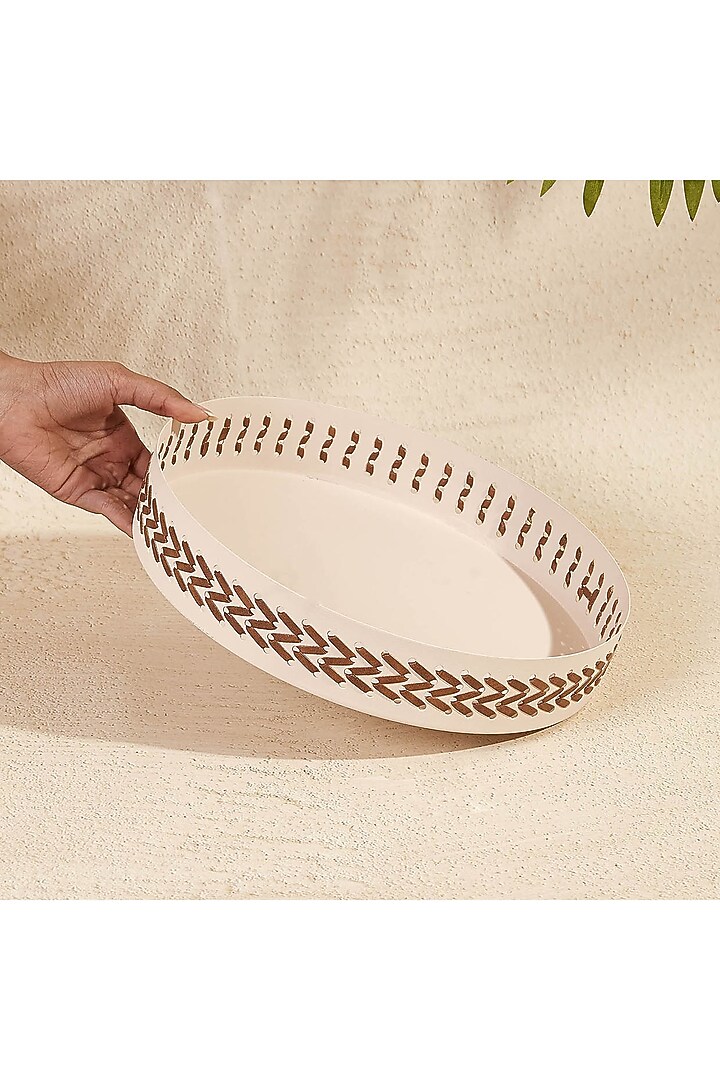 Ivory Metal & Faux Leather Round Serving Tray by Mason Home at Pernia's Pop Up Shop