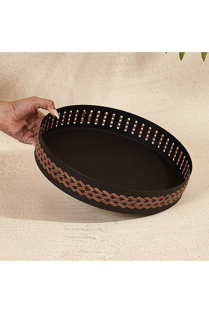 Black Metal & Faux Leather Round Serving Tray by Mason Home at Pernia's Pop Up Shop