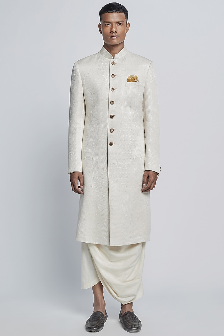 White Sherwani Set With Gold Buttons by Divyam Mehta Men
