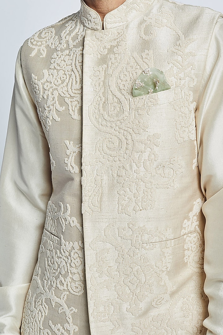 Ivory Raw Silk & Dupion Silk Pearl Embroidered Sadri Bundi Jacket Set by Divyam Mehta Men at Pernia's Pop Up Shop