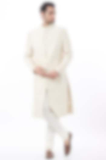 Ivory Raw Silk Sherwani Set by Divyam Mehta Men