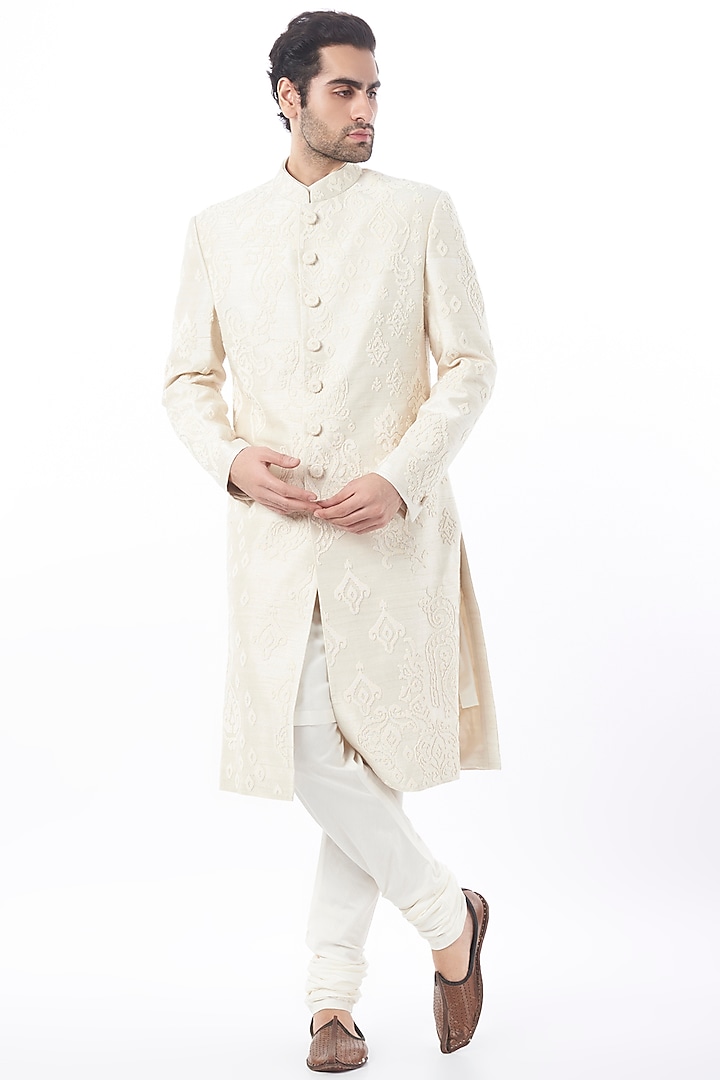 Ivory Raw Silk Sherwani Set by Divyam Mehta Men